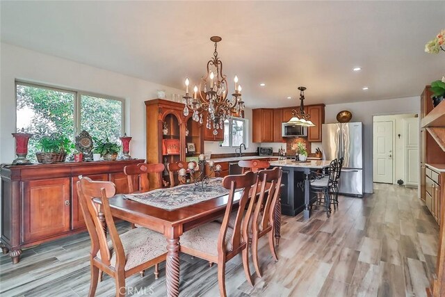 240 Portal St, Oak View, CA 93022 - dining area with a chandelier, light wood-type flooring, and recessed lighting
