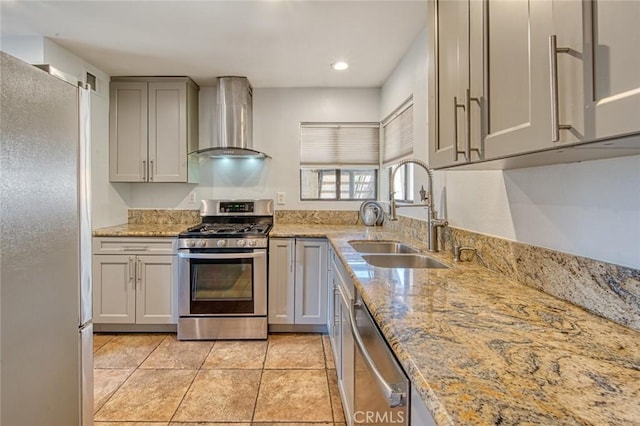 28282 Sorrento Unit 147, Laguna Niguel, CA 92677 - kitchen with wall chimney range hood, stainless steel appliances, a sink, light stone counters, and light tile patterned floors