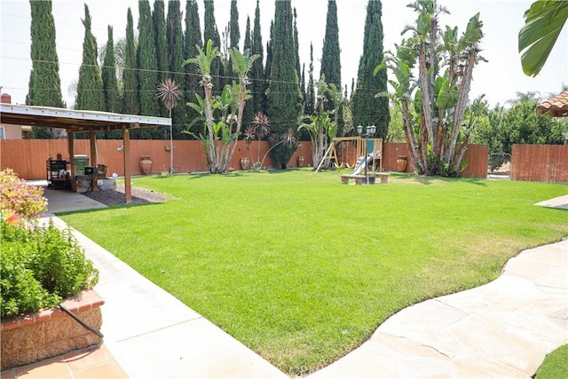 5685 Ptolemy Way, Jurupa Valley, CA 91752 - view of yard with a patio and a playground