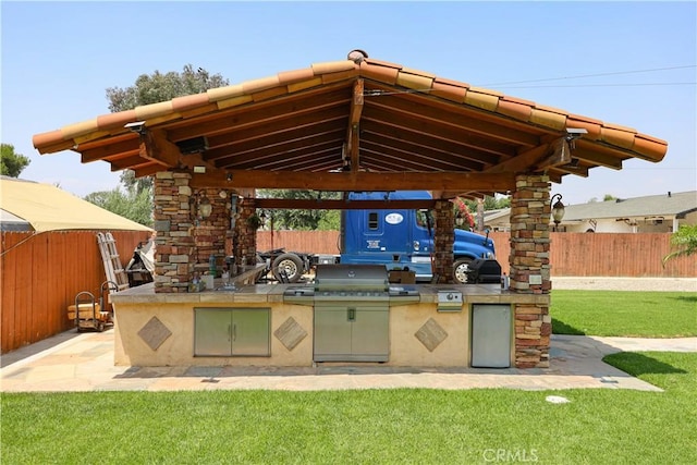 5685 Ptolemy Way, Jurupa Valley, CA 91752 - view of patio / terrace with exterior kitchen and a gazebo