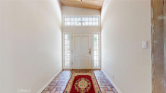 12 Pinto Ln, Rolling Hills Estates, CA 90274 - entrance foyer with brick flooring, high vaulted ceiling, and wooden ceiling