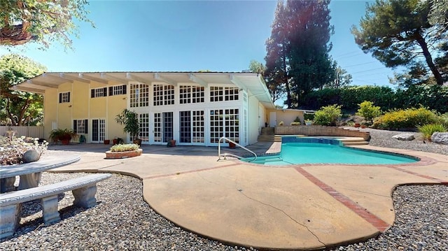12 Pinto Ln, Rolling Hills Estates, CA 90274 - view of swimming pool with french doors and a patio
