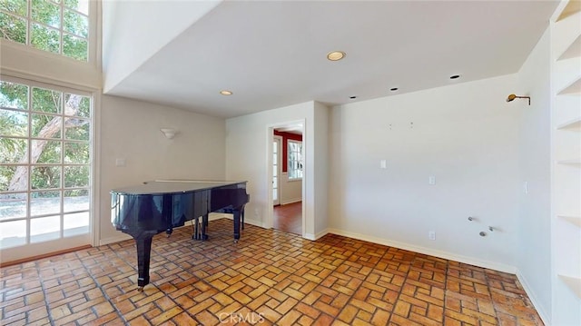12 Pinto Ln, Rolling Hills Estates, CA 90274 - unfurnished room featuring healthy amount of natural light, brick patterned floors, and recessed lighting