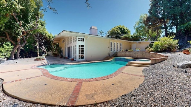 12 Pinto Ln, Rolling Hills Estates, CA 90274 - outdoor pool featuring french doors and a patio