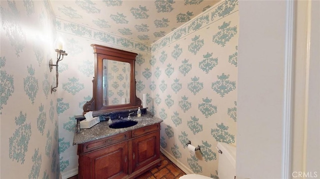 12 Pinto Ln, Rolling Hills Estates, CA 90274 - half bathroom featuring wallpapered walls and vanity