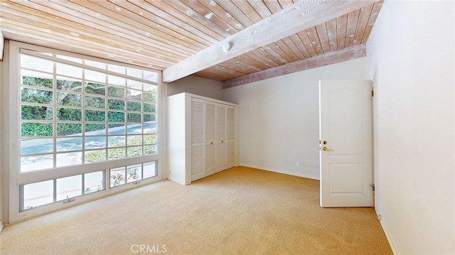 12 Pinto Ln, Rolling Hills Estates, CA 90274 - unfurnished bedroom featuring light colored carpet, wooden ceiling, and a closet