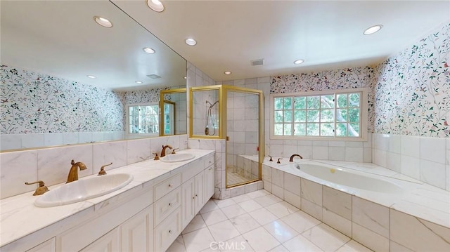 12 Pinto Ln, Rolling Hills Estates, CA 90274 - bathroom with wallpapered walls, a garden tub, a shower stall, recessed lighting, and double vanity
