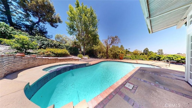 12 Pinto Ln, Rolling Hills Estates, CA 90274 - view of swimming pool featuring a patio area and a pool with connected hot tub