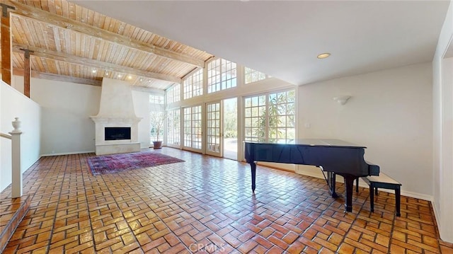 12 Pinto Ln, Rolling Hills Estates, CA 90274 - living room with a wood ceiling with exposed beams, brick flooring, a large fireplace, and high vaulted ceiling