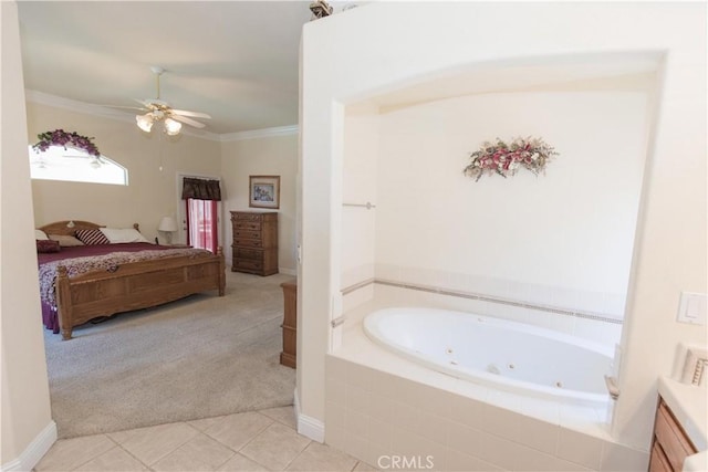 337 W Trenton Ave, Clovis, CA 93619 - bathroom featuring ensuite bath, a tub with jets, ceiling fan, tile patterned floors, and crown molding