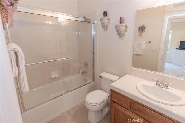 337 W Trenton Ave, Clovis, CA 93619 - full bath with vanity, shower / bath combination with glass door, and tile patterned floors