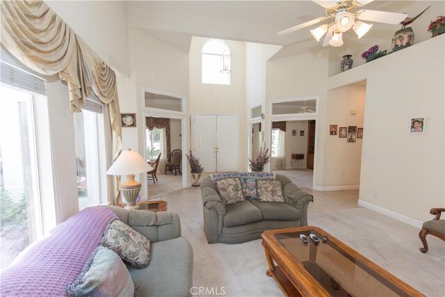 337 W Trenton Ave, Clovis, CA 93619 - living area with a towering ceiling, ceiling fan, and light colored carpet