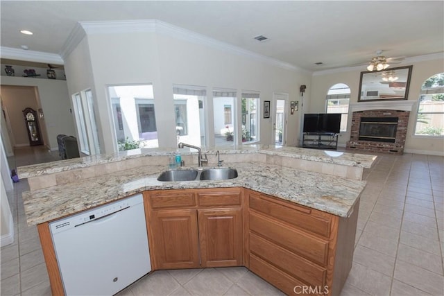 337 W Trenton Ave, Clovis, CA 93619 - kitchen with white dishwasher, open floor plan, light tile patterned floors, ceiling fan, and light stone countertops