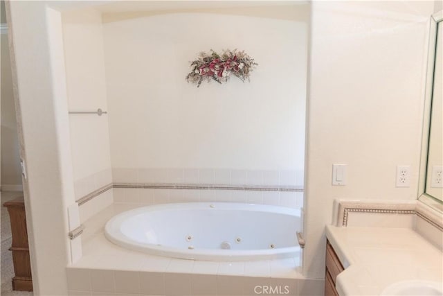 337 W Trenton Ave, Clovis, CA 93619 - bathroom featuring a tub with jets and vanity