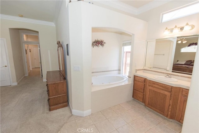 337 W Trenton Ave, Clovis, CA 93619 - ensuite bathroom featuring crown molding, a jetted tub, vanity, and tile patterned floors