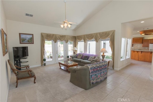 337 W Trenton Ave, Clovis, CA 93619 - living room featuring a ceiling fan, light tile patterned flooring, and high vaulted ceiling