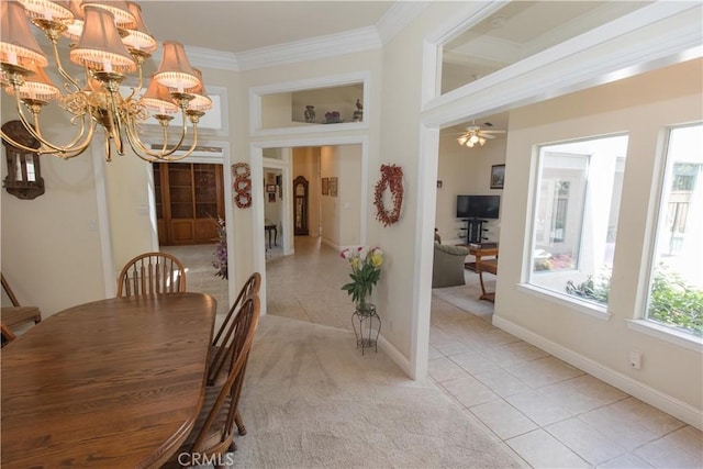 337 W Trenton Ave, Clovis, CA 93619 - dining room with light tile patterned floors, crown molding, a chandelier, a ceiling fan, and light carpet