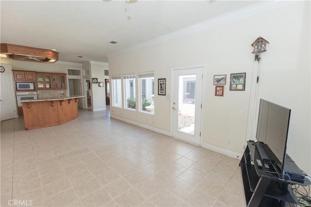 337 W Trenton Ave, Clovis, CA 93619 - unfurnished living room with crown molding and light tile patterned flooring