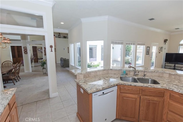 337 W Trenton Ave, Clovis, CA 93619 - kitchen with white dishwasher, light carpet, light tile patterned flooring, open floor plan, and ornamental molding