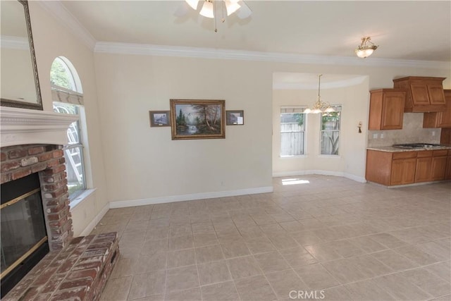 337 W Trenton Ave, Clovis, CA 93619 - unfurnished living room with a brick fireplace, crown molding, a ceiling fan, a chandelier, and light tile patterned floors