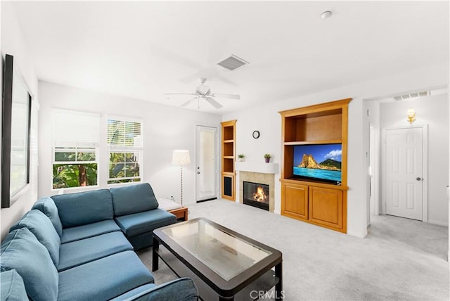 32 Perennial, Irvine, CA 92603 - carpeted living room with ceiling fan and a fireplace with flush hearth