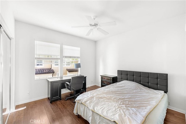 32 Perennial, Irvine, CA 92603 - bedroom with dark wood-type flooring, an office area, a ceiling fan, and a closet