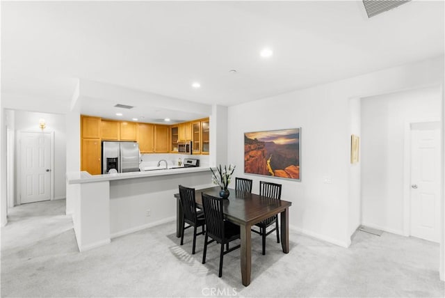 32 Perennial, Irvine, CA 92603 - dining room with light colored carpet and recessed lighting