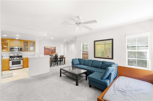 32 Perennial, Irvine, CA 92603 - living room featuring recessed lighting, light colored carpet, and a ceiling fan