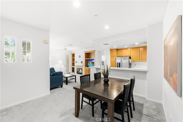 32 Perennial, Irvine, CA 92603 - dining space with light carpet, recessed lighting, and a ceiling fan