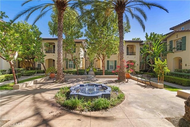 32 Perennial, Irvine, CA 92603 - view of front of property with stucco siding and a tiled roof