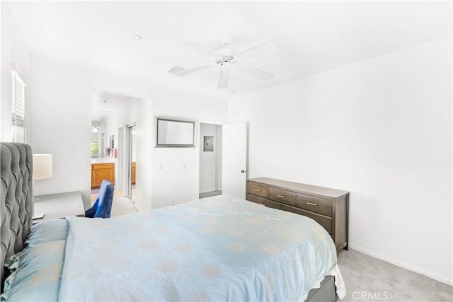 32 Perennial, Irvine, CA 92603 - bedroom featuring light colored carpet, ensuite bathroom, and a ceiling fan