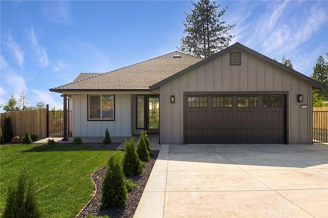 1773 Drendel Cir, Paradise, CA 95969 - view of front of house featuring an attached garage, concrete driveway, and board and batten siding