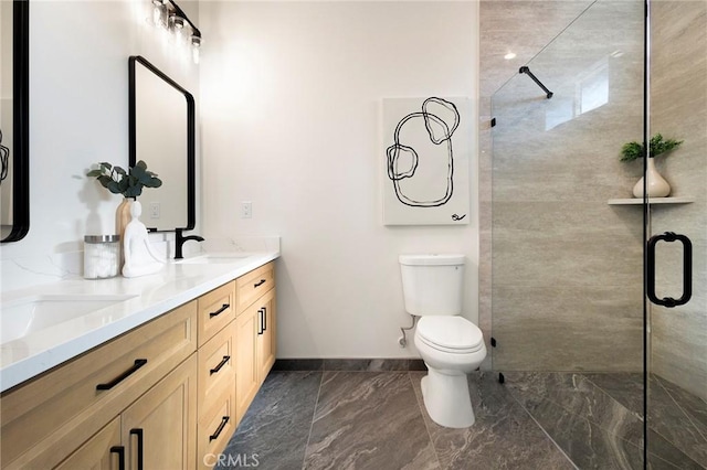 1773 Drendel Cir, Paradise, CA 95969 - full bathroom with marble tiled flooring, toilet, a tile shower, and double vanity