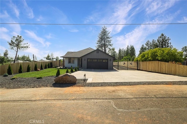1773 Drendel Cir, Paradise, CA 95969 - view of front of property with a garage, concrete driveway, and board and batten siding