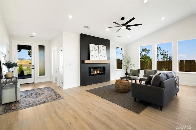 1773 Drendel Cir, Paradise, CA 95969 - living room featuring wood finished floors, lofted ceiling, a fireplace, recessed lighting, and ceiling fan