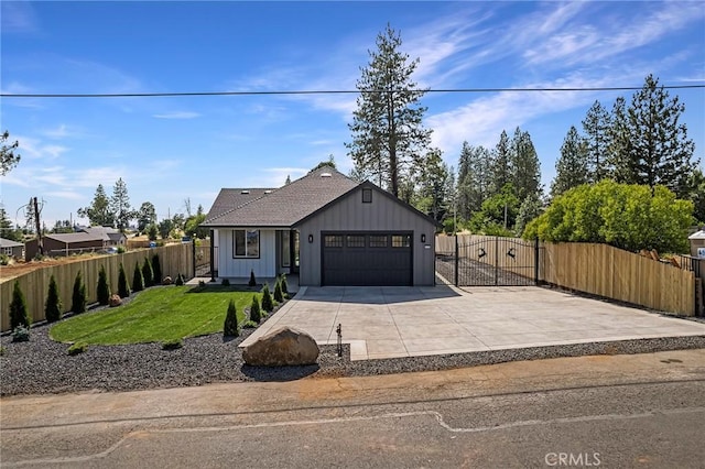 1773 Drendel Cir, Paradise, CA 95969 - view of front of house with a garage, concrete driveway, and a gate