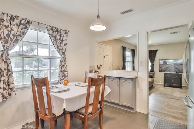 2025 N Buena Vista St, Burbank, CA 91504 - dining room featuring baseboards and tile patterned flooring