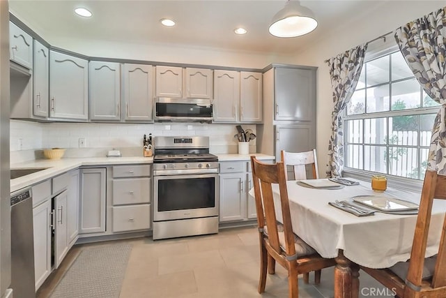 2025 N Buena Vista St, Burbank, CA 91504 - kitchen featuring stainless steel appliances, gray cabinets, decorative backsplash, light countertops, and recessed lighting