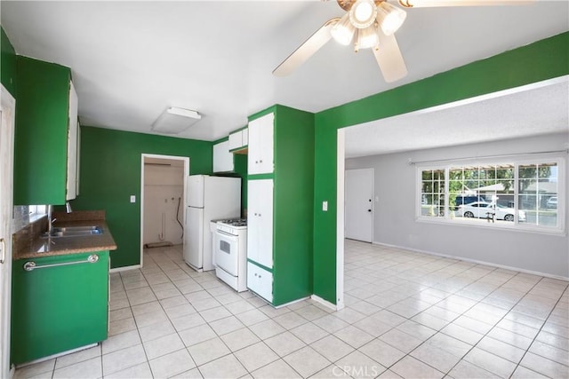 3825 Lofton Pl, Riverside, CA 92501 - kitchen with white appliances, a sink, light tile patterned floors, ceiling fan, and baseboards