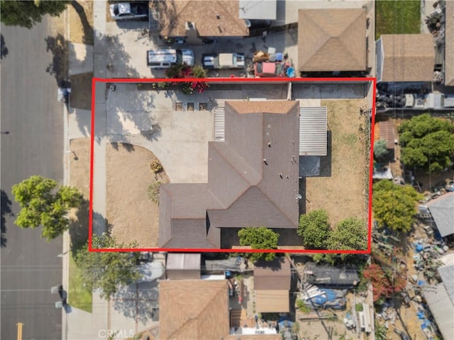 3825 Lofton Pl, Riverside, CA 92501 - aerial view of property and surrounding area featuring property parcel outlined