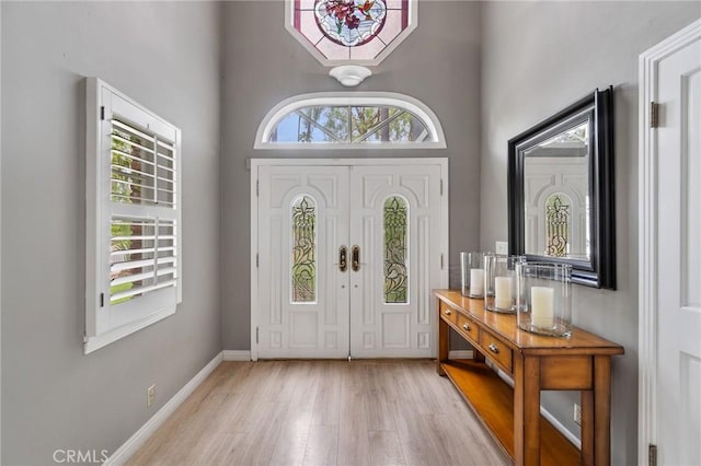 4455 Atoll Ave, Sherman Oaks, CA 91423 - foyer entrance featuring a high ceiling, wood finished floors, and baseboards