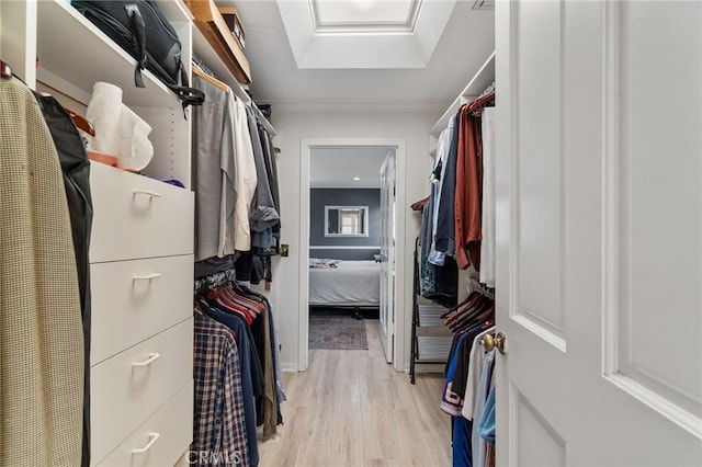 4455 Atoll Ave, Sherman Oaks, CA 91423 - walk in closet with light wood finished floors