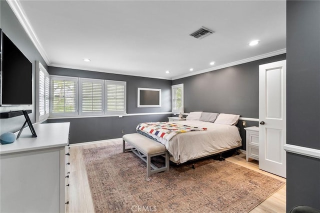4455 Atoll Ave, Sherman Oaks, CA 91423 - bedroom featuring crown molding, light wood-type flooring, and recessed lighting