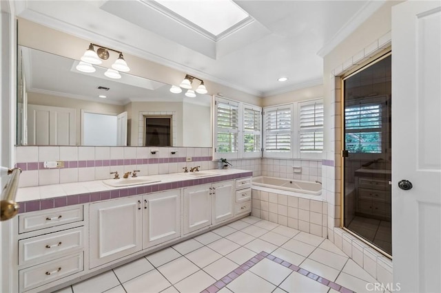 4455 Atoll Ave, Sherman Oaks, CA 91423 - bathroom featuring tile patterned floors, double vanity, a garden tub, ornamental molding, and a shower with shower door