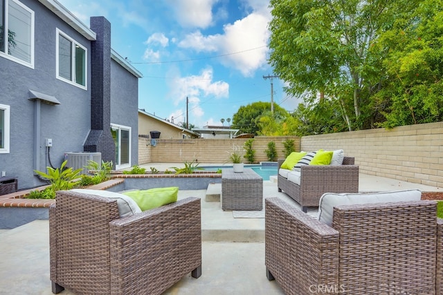 24162 Twig St, Lake Forest, CA 92630 - fenced backyard with an outdoor hangout area, central air condition unit, and a patio area