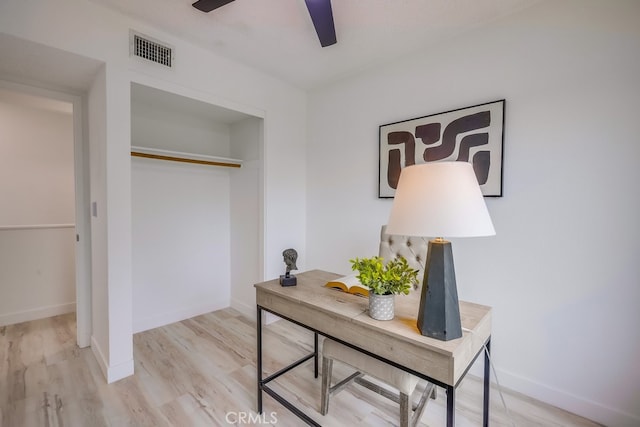 24162 Twig St, Lake Forest, CA 92630 - home office featuring a ceiling fan, light wood-style flooring, and baseboards