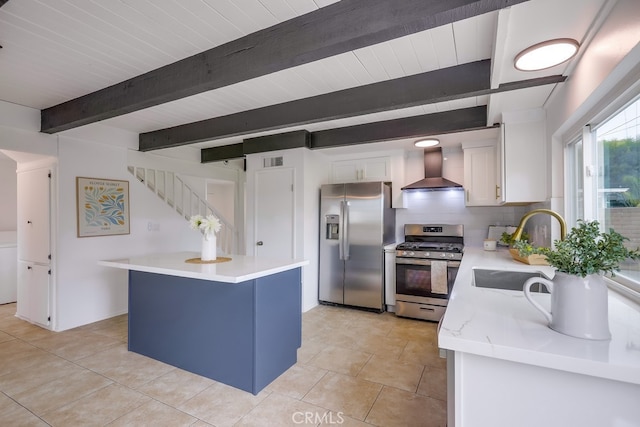 24162 Twig St, Lake Forest, CA 92630 - kitchen featuring appliances with stainless steel finishes, wall chimney range hood, a sink, white cabinets, and a kitchen island