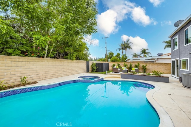 24162 Twig St, Lake Forest, CA 92630 - view of pool with a fenced backyard, a pool with connected hot tub, a patio, and cooling unit