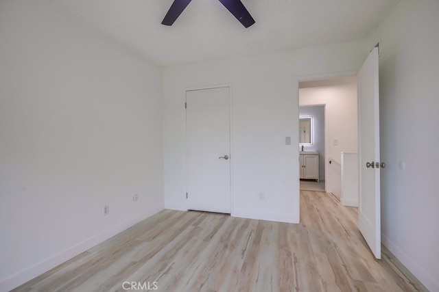 24162 Twig St, Lake Forest, CA 92630 - unfurnished bedroom featuring light wood-type flooring, baseboards, and ceiling fan