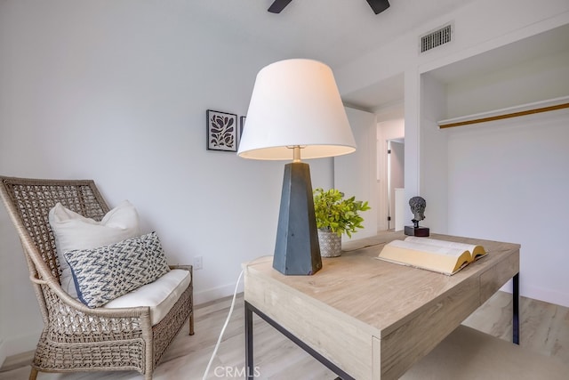 24162 Twig St, Lake Forest, CA 92630 - home office with wood finished floors, a ceiling fan, and baseboards